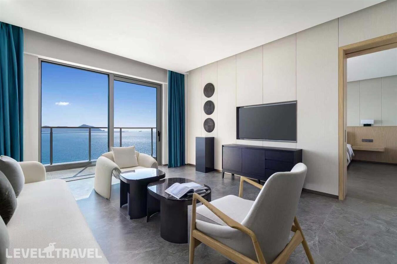фотографии номера Люкс с панорамным видом на океан отеля Sanya Junji Seaview Hotel в Китай(Санья) - фото №2