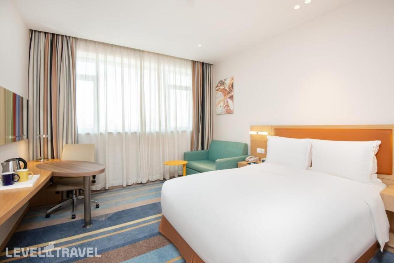 фотографии номера Люкс для людей с ограниченными возможностями отеля Holiday Inn Express Shanghai Zhenping в Китай(Шанхай) - фото №1