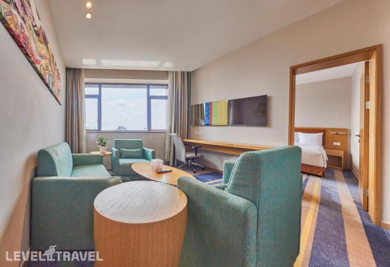 фотографии номера Люкс для людей с ограниченными возможностями отеля Holiday Inn Express Shanghai Zhenping в Китай(Шанхай) - фото №2