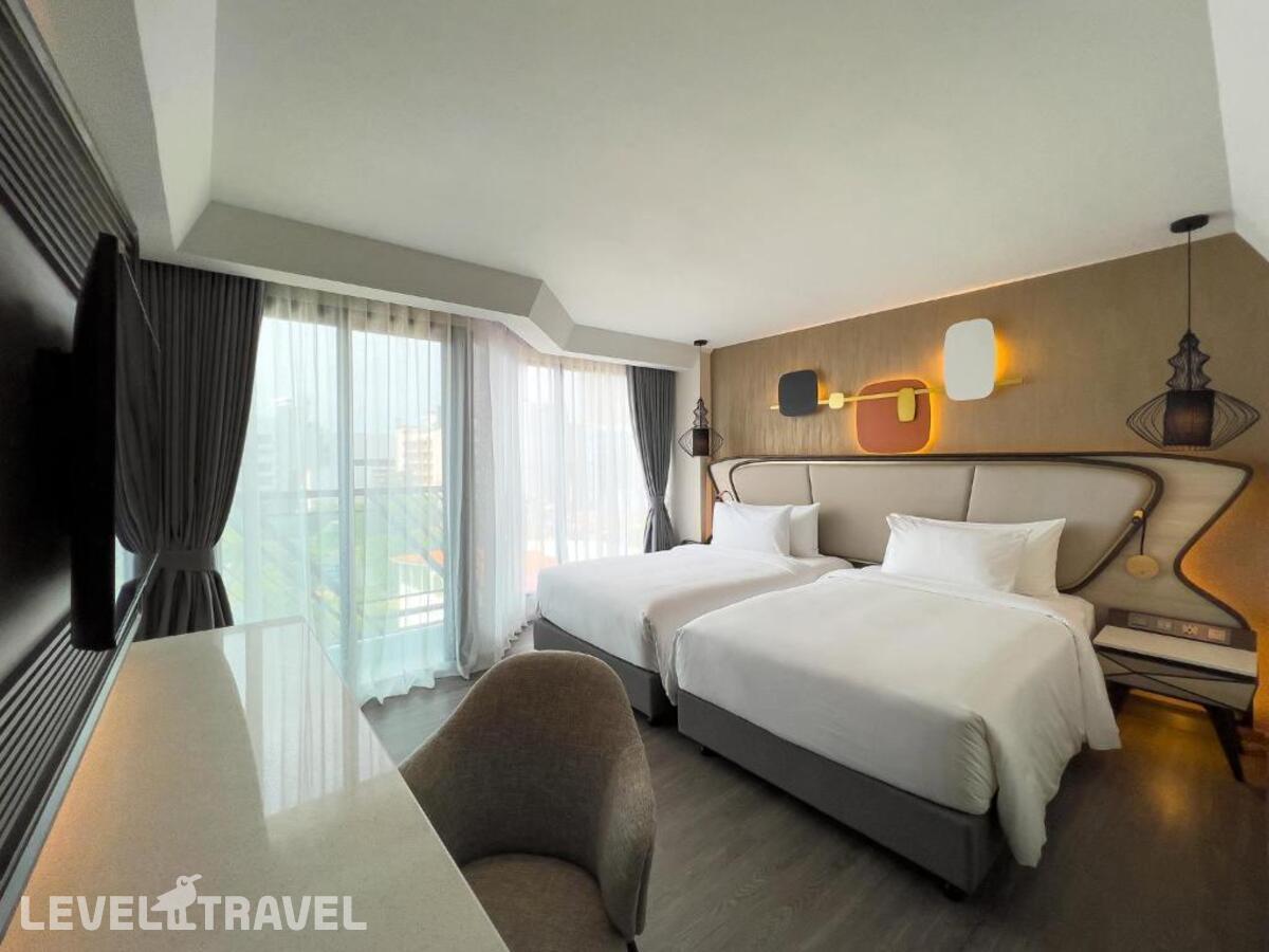фотографии номера Делюкс (две односпальные кровати) отеля Amethyst Hotel Pattaya в Таиланд(Центральная Паттайя) - фото №1