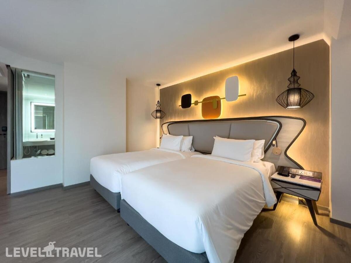 фотографии номера Премьер (две односпальные кровати) отеля Amethyst Hotel Pattaya в Таиланд(Центральная Паттайя) - фото №1