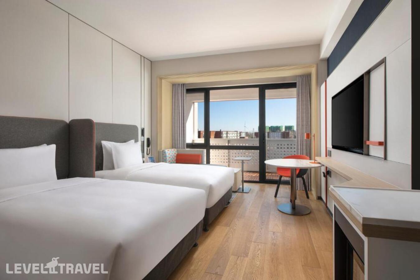фотографии номера Номер смарт (две односпальные кровати) отеля Holiday Inn Express Beijing Yizhuang Center, An Ihg Hotel в Китай(Пекин) - фото №1