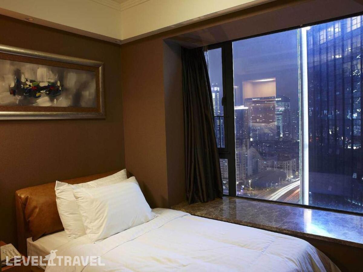 фотографии номера Апартаменты Boutique (1 спальня) отеля Dan Executive Apartment Guangzhou в Китай(Гуанчжоу) - фото №1
