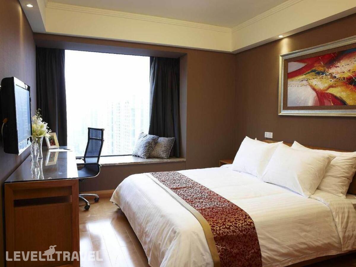 фотографии номера Апартаменты представительские (2 спальни) отеля Dan Executive Apartment Guangzhou в Китай(Гуанчжоу) - фото №1