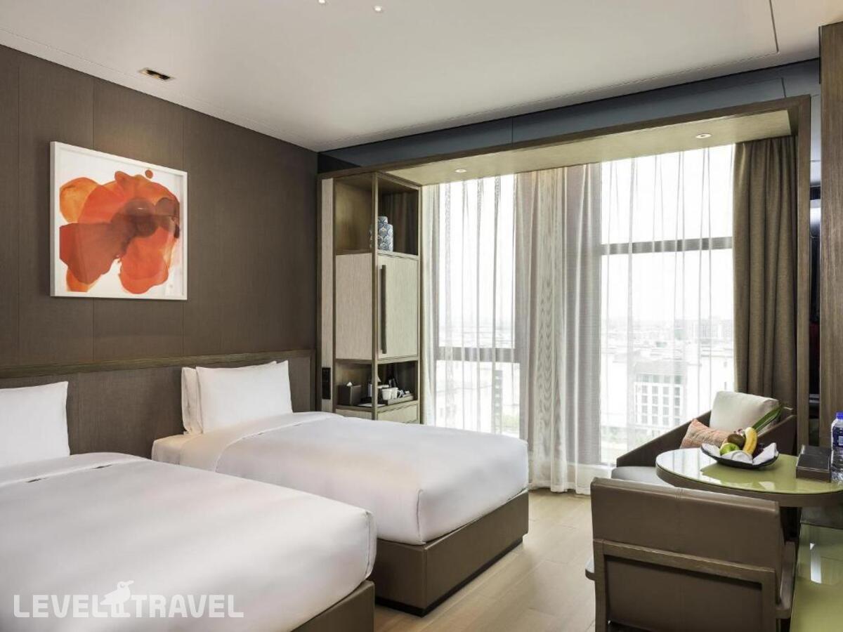 фотографии номера Улучшенный (две односпальные кровати) отеля Novotel Shanghai Clover в Китай(Шанхай) - фото №1