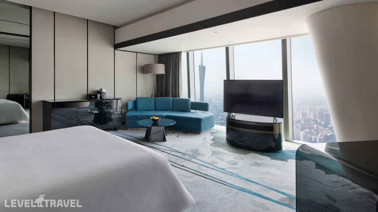 фотографии номера Улучшенный с видом на башню отеля Four Seasons Guangzhou в Китай(Гуанчжоу) - фото №1