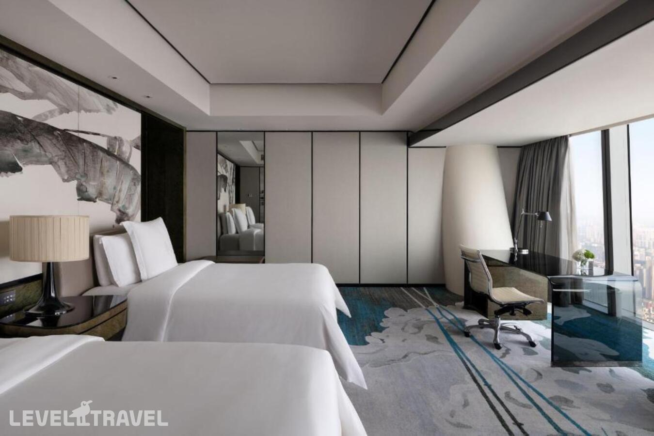 фотографии номера Делюкс с видом на реку (две двуспальные кровати) отеля Four Seasons Guangzhou в Китай(Гуанчжоу) - фото №1