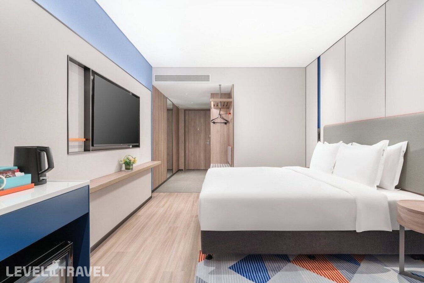 фотографии номера Стандартный с холодильником отеля Holiday Inn Express Guangzhou Panyu Dashi By Ihg в Китай(Гуанчжоу) - фото №1
