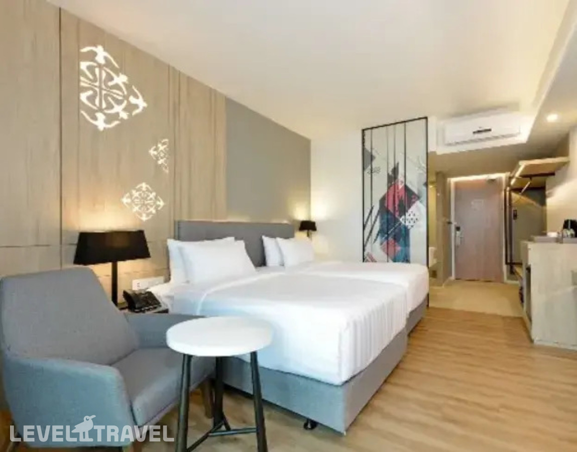 фотографии номера Делюкс с видом на город (две односпальные кровати) отеля Hotel Amber Pattaya в Таиланд(Центральная Паттайя) - фото №1