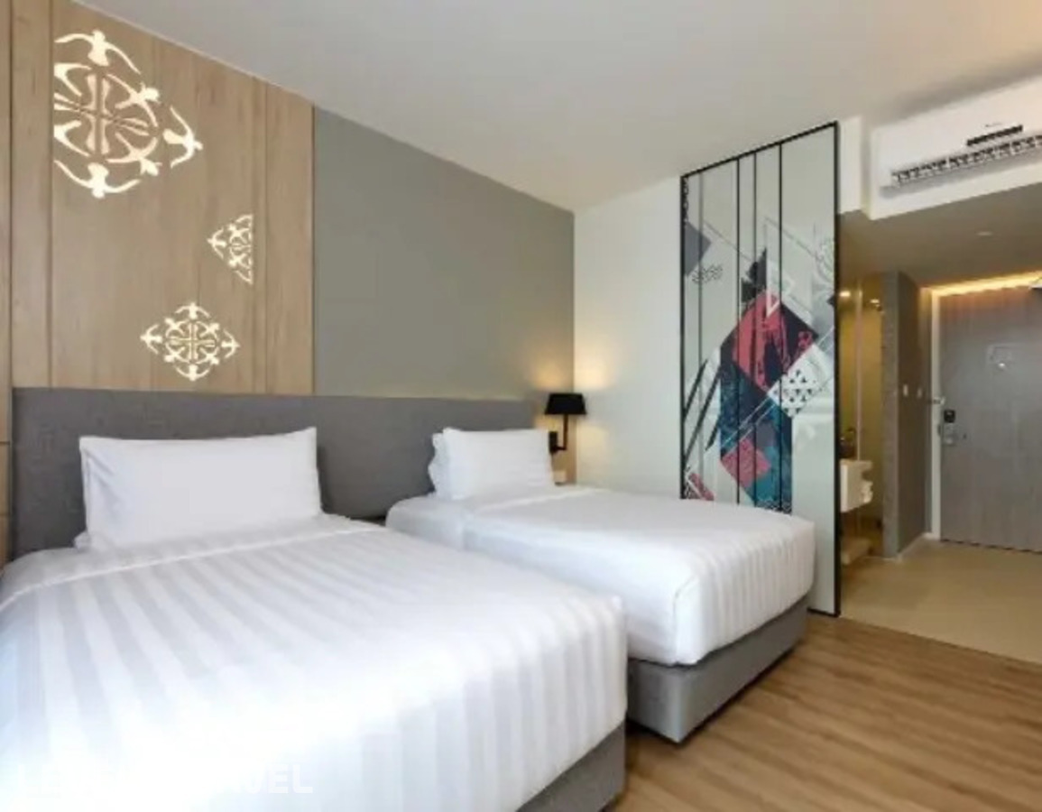 фотографии номера Делюкс с видом на город (две односпальные кровати) отеля Hotel Amber Pattaya в Таиланд(Центральная Паттайя) - фото №2