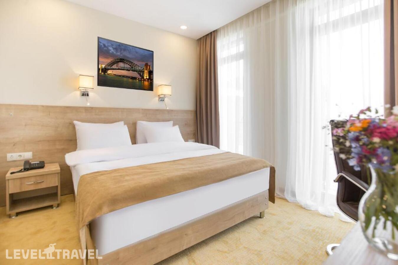 фотографии номера Стандартный номер отеля Atrium Boutique Hotel (Ex. Bridge Boutique Hotel) в Грузия(Тбилиси) - фото №1