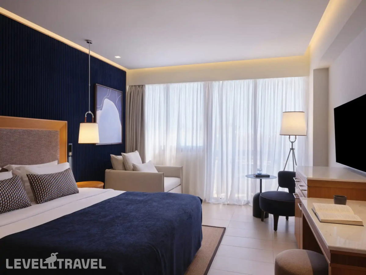 фотографии номера Премиум с видом на бассейн отеля Atlantica Oasis в Кипр(Потамос Гермасойя) - фото №1