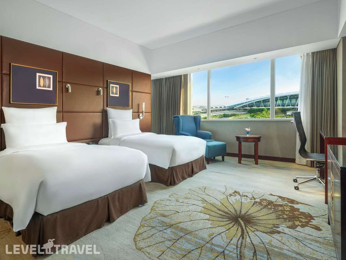 фотографии номера Делюкс (две односпальные кровати) отеля Pullman Guangzhou Baiyun Airport в Китай(Гуанчжоу) - фото №1