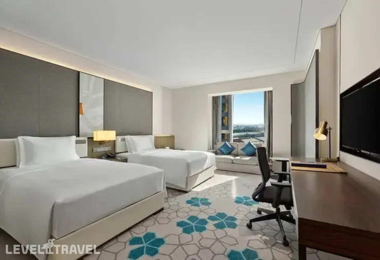 фотографии номера Делюкс (две односпальные кровати) отеля Doubletree By Hilton Baoding в Китай(Баодин) - фото №1