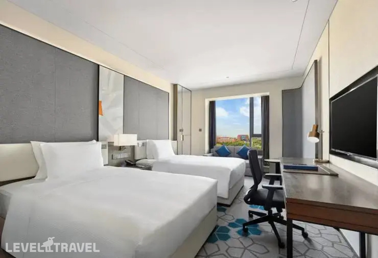 фотографии номера Делюкс (две односпальные кровати) отеля Doubletree By Hilton Baoding в Китай(Баодин) - фото №3