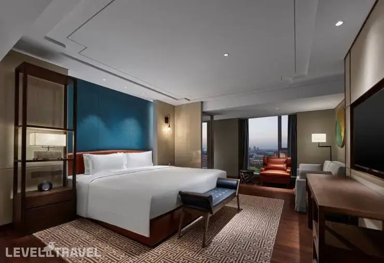 фотографии номера Люкс президентский отеля Doubletree By Hilton Baoding в Китай(Баодин) - фото №1