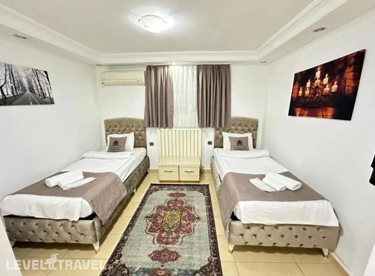 фотографии номера Четырехместный с балконом отеля Апарт-Отель Elegance Cihangir Apart в Турция(Таксим) - фото №8