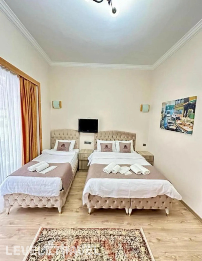 фотографии номера Четырехместный с балконом отеля Апарт-Отель Elegance Cihangir Apart в Турция(Таксим) - фото №7