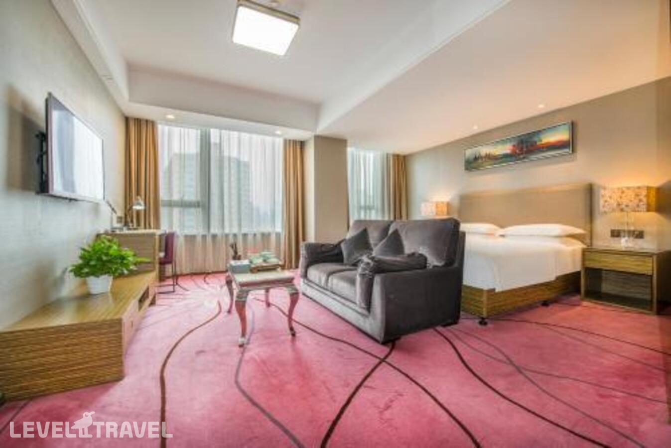 фотографии номера Делюкс отеля La Perle International Hotel в Китай(Гуанчжоу) - фото №1