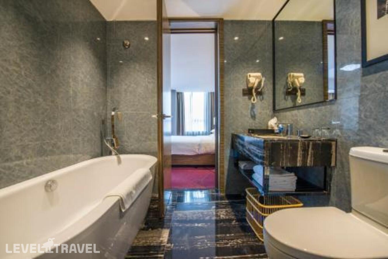 фотографии номера Делюкс отеля La Perle International Hotel в Китай(Гуанчжоу) - фото №2