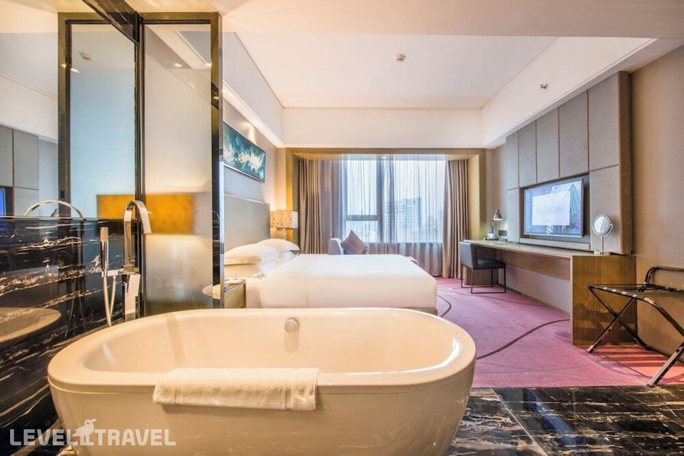 фотографии номера Люкс Бизнес отеля La Perle International Hotel в Китай(Гуанчжоу) - фото №2