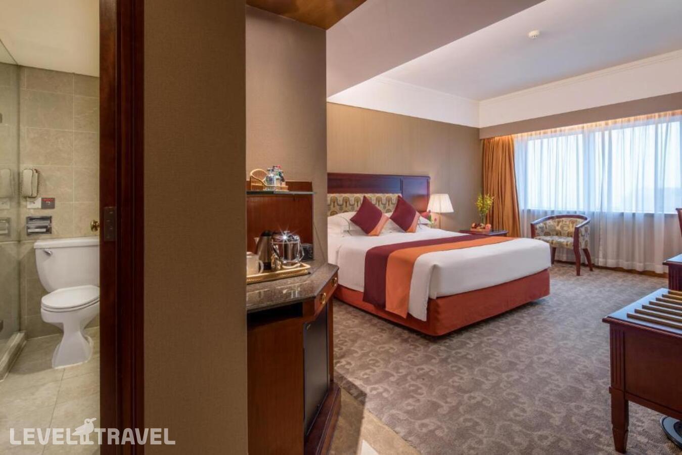 фотографии номера Делюкс отеля Asia International Hotel Guangzhou в Китай(Гуанчжоу) - фото №2