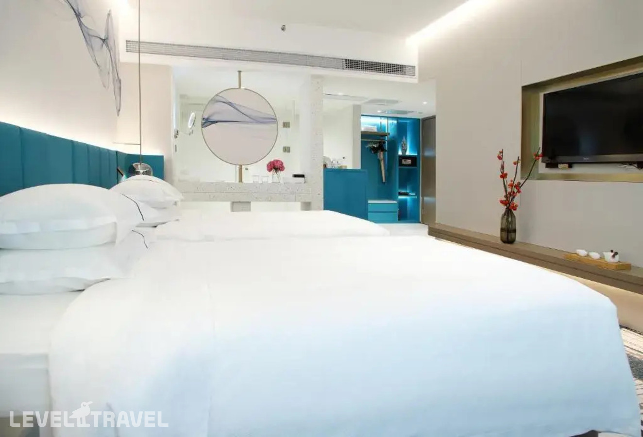 фотографии номера Номер Bliss  (две односпальные кровати) отеля Asia International Hotel Guangzhou в Китай(Гуанчжоу) - фото №2