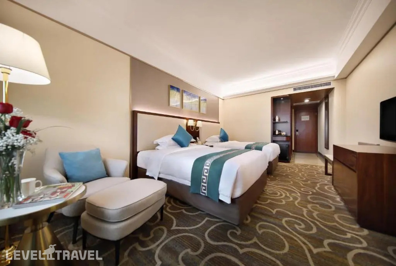 фотографии номера Номер бизнес (две односпальные кровати) отеля Asia International Hotel Guangzhou в Китай(Гуанчжоу) - фото №3