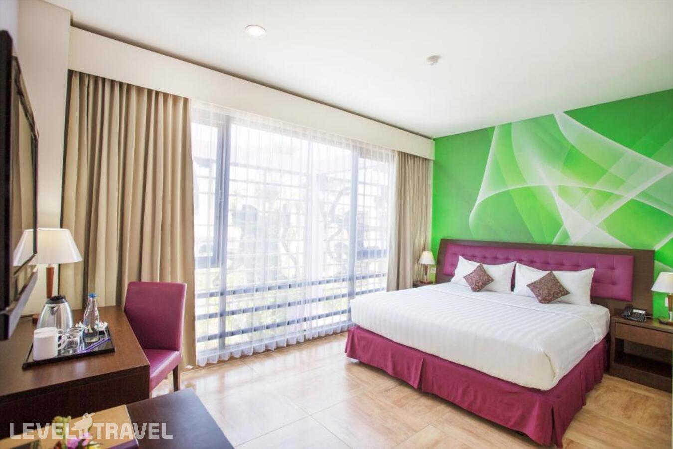 фотографии номера Улучшенный (две односпальные кровати) отеля Kuta Central Park Hotel в Индонезия(Кута) - фото №1