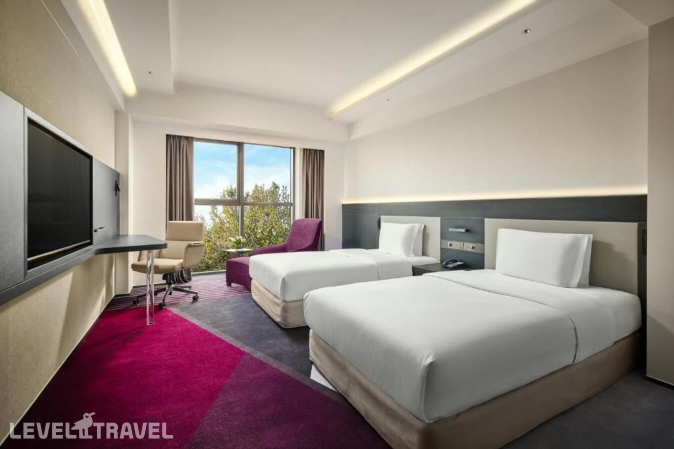 фотографии номера Премиум (две односпальные кровати) отеля Crowne Plaza Beijing International Airport, An Ihg Hotel в Китай(Пекин) - фото №1