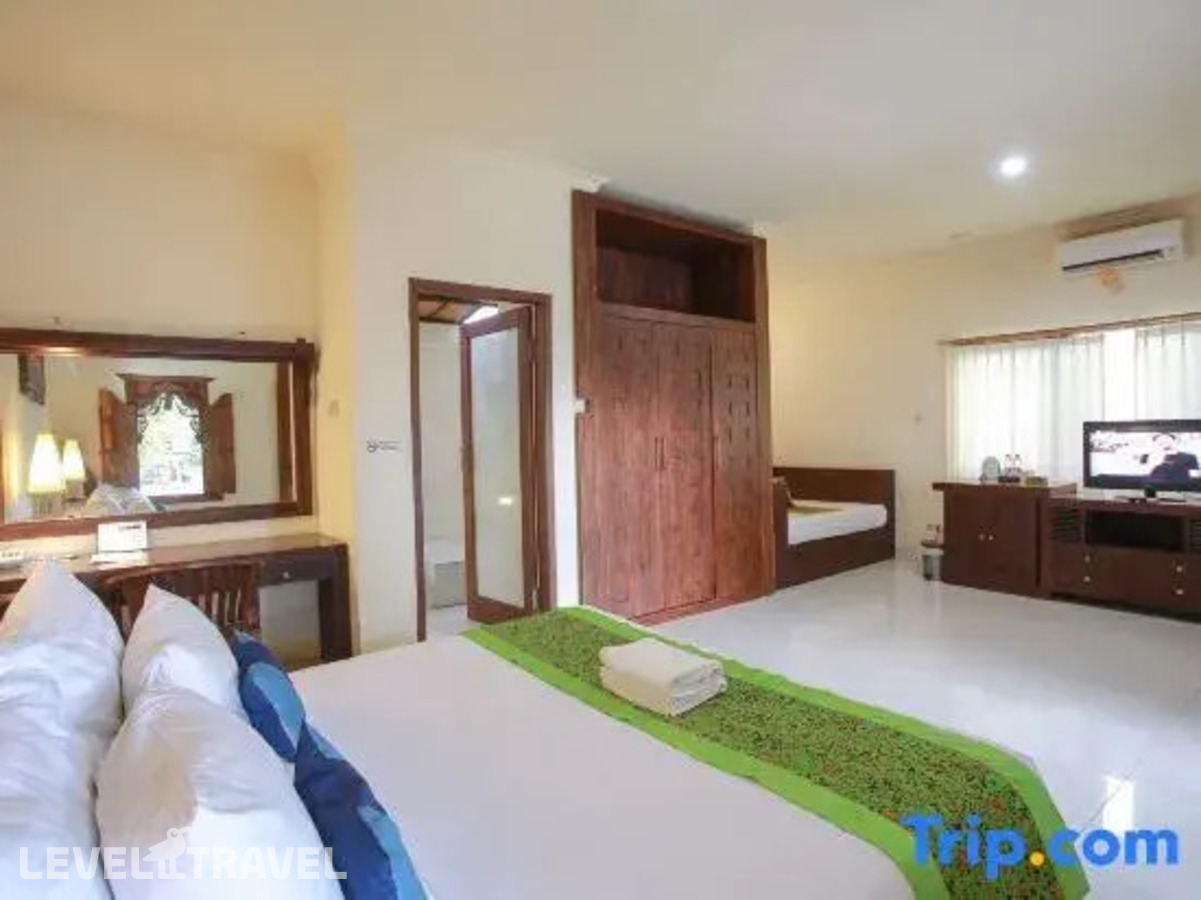фотографии номера Бунгало делюкс отеля Mirah Hotel в Индонезия(Баньюванги) - фото №4