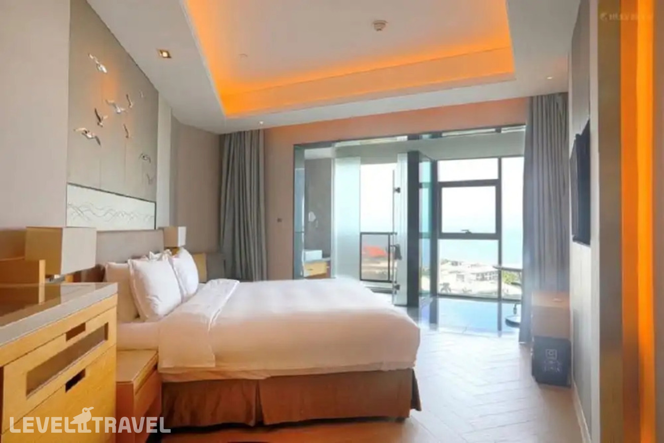 фотографии номера Стандартный номер отеля Holiday Inn Haikou West Coast, An Ihg Hotel в Китай(Хайкоу) - фото №1