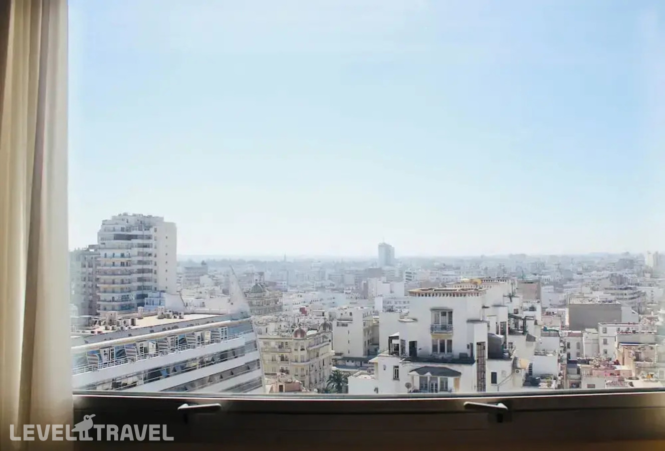 фотографии номера Делюкс с видом на бассейн отеля Golden Tulip Farah Casablanca в Марокко(Касабланка) - фото №7
