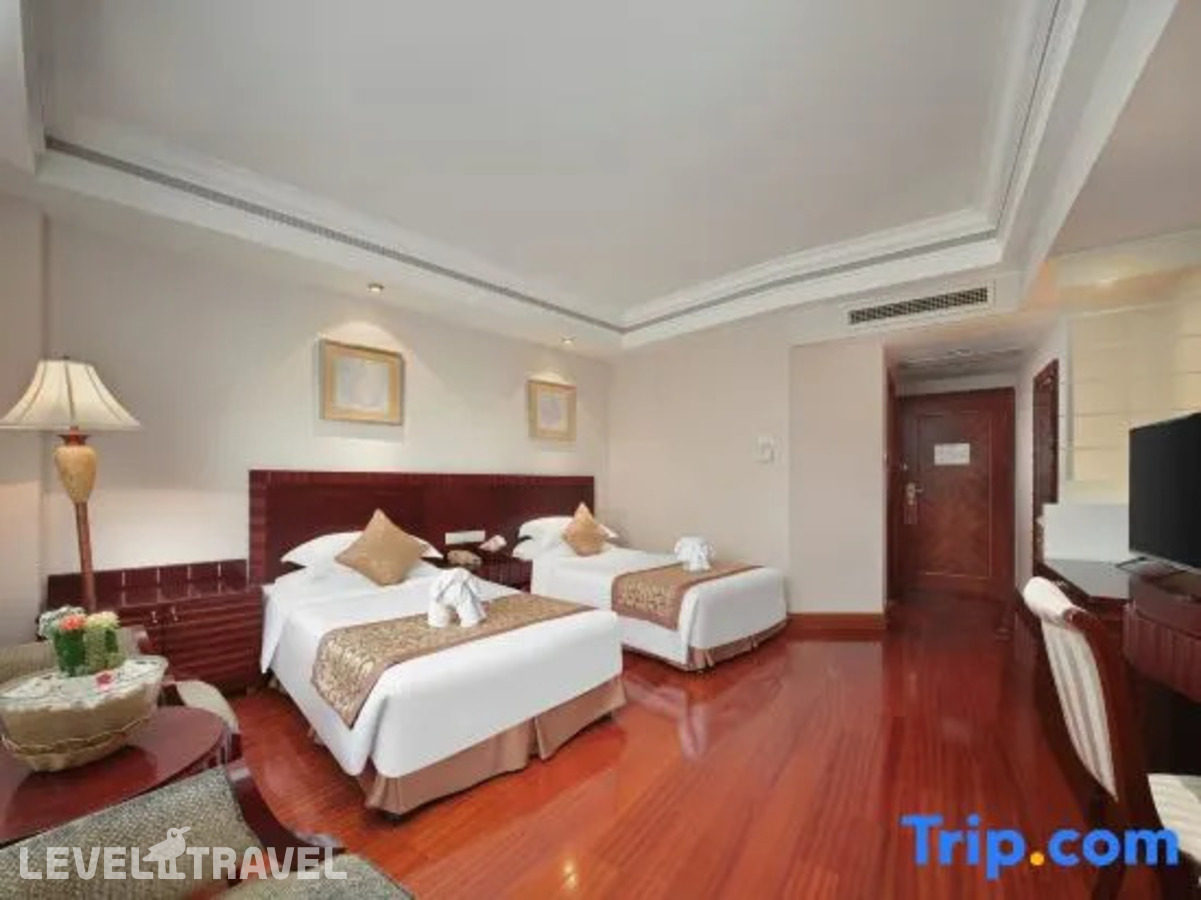 фотографии номера Комфорт (две односпальные кровати) отеля Sanya Jinjiang Baohong Hotel Annex Building в Китай(Дадунхай Бэй) - фото №1