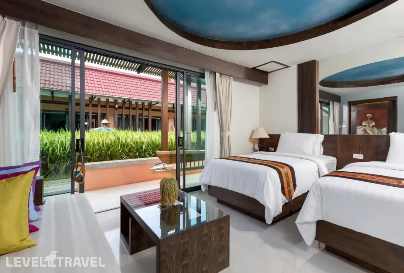 фотографии номера Делюкс с видом на сад с балконом отеля Naina Resort & Spa в Таиланд(Патонг Бич) - фото №3