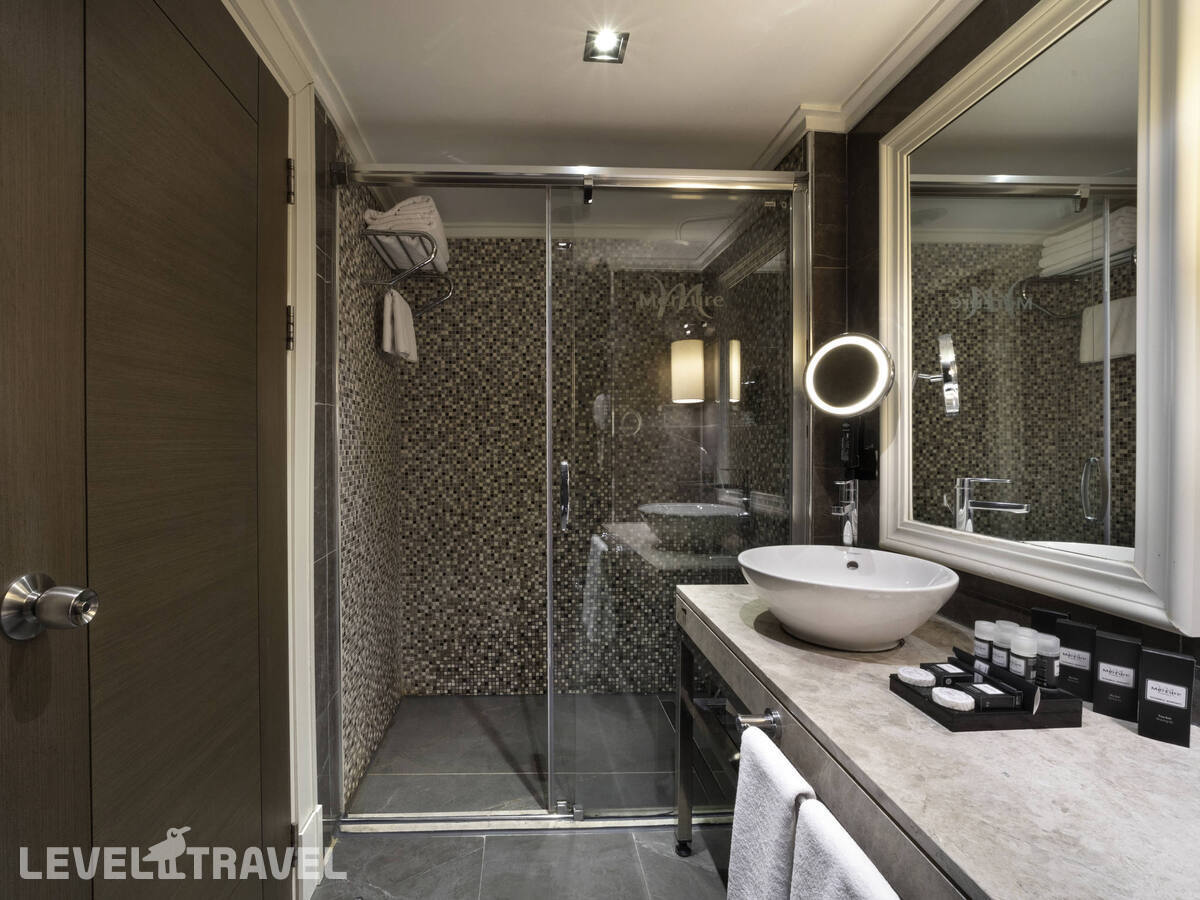 фотографии номера Улучшенный (две односпальные кровати) отеля Mercure Istanbul Bomonti в Турция(Бомонти) - фото №3