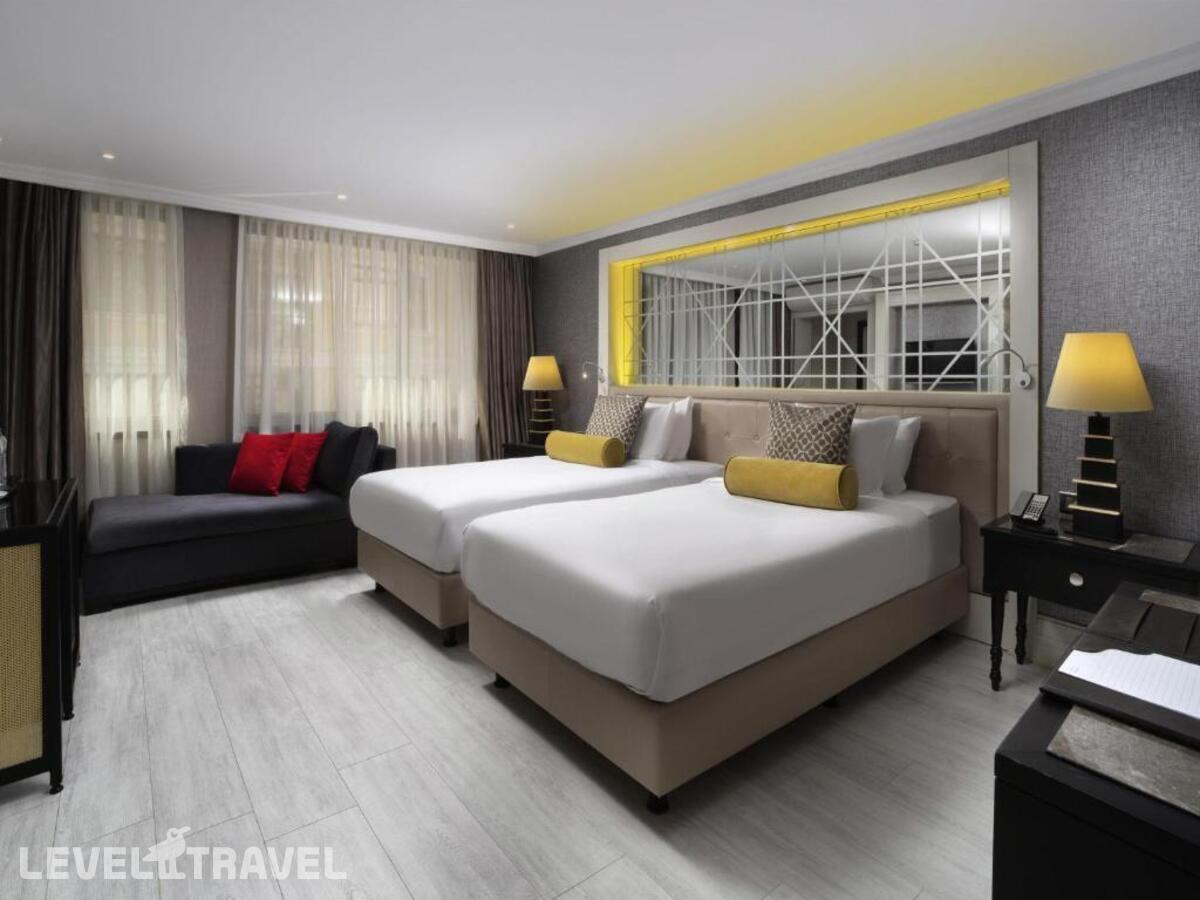 фотографии номера Делюкс (две односпальные кровати) отеля Mercure Istanbul Bomonti в Турция(Бомонти) - фото №1