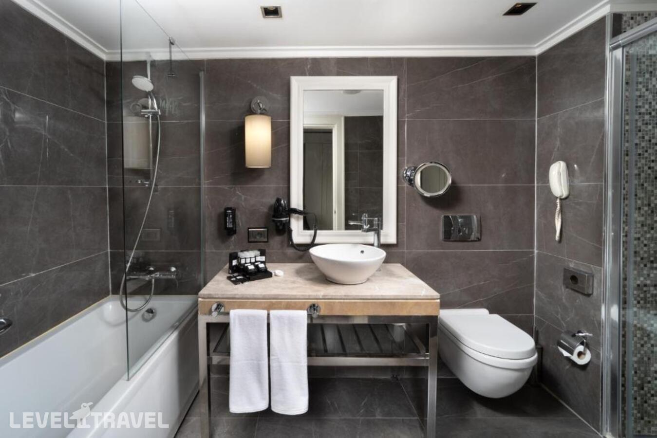 фотографии номера Делюкс (две односпальные кровати) отеля Mercure Istanbul Bomonti в Турция(Бомонти) - фото №2