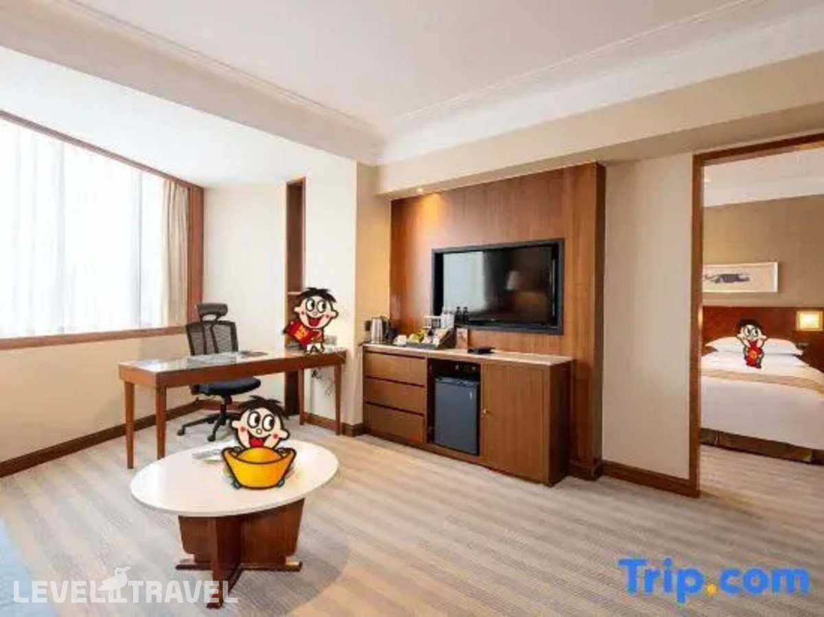 фотографии номера Двухместный люкс Executive 2 отдельные кровати отеля San Want Hotel в Китай(Шанхай) - фото №3