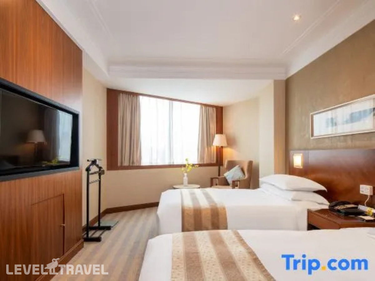 фотографии номера Двухместный люкс Executive 2 отдельные кровати отеля San Want Hotel в Китай(Шанхай) - фото №2