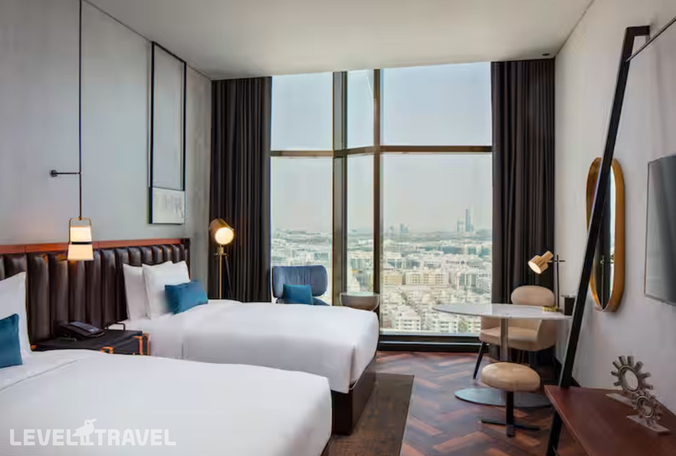 фотографии номера Смежный семейный отеля Doubletree By Hilton Dubai M Square Hotel & Residences в ОАЭ(Бар Дубай) - фото №1