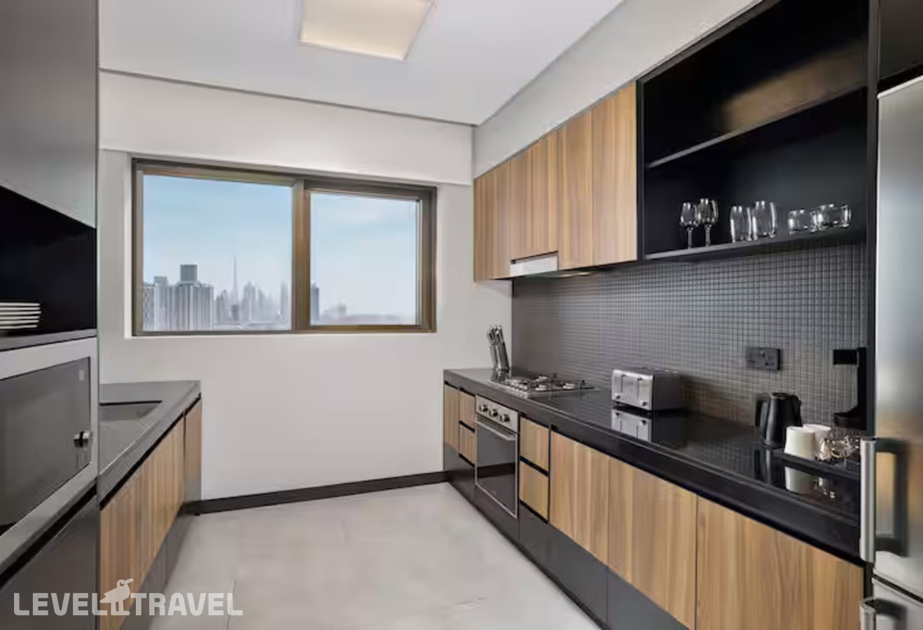 фотографии номера Семейный люкс (3 спальни) отеля Doubletree By Hilton Dubai M Square Hotel & Residences в ОАЭ(Бар Дубай) - фото №4