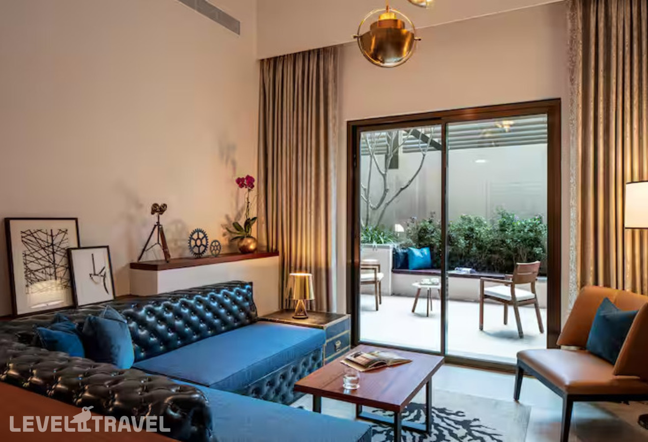 фотографии номера Люкс (1 спальня) отеля Doubletree By Hilton Dubai M Square Hotel & Residences в ОАЭ(Бар Дубай) - фото №1