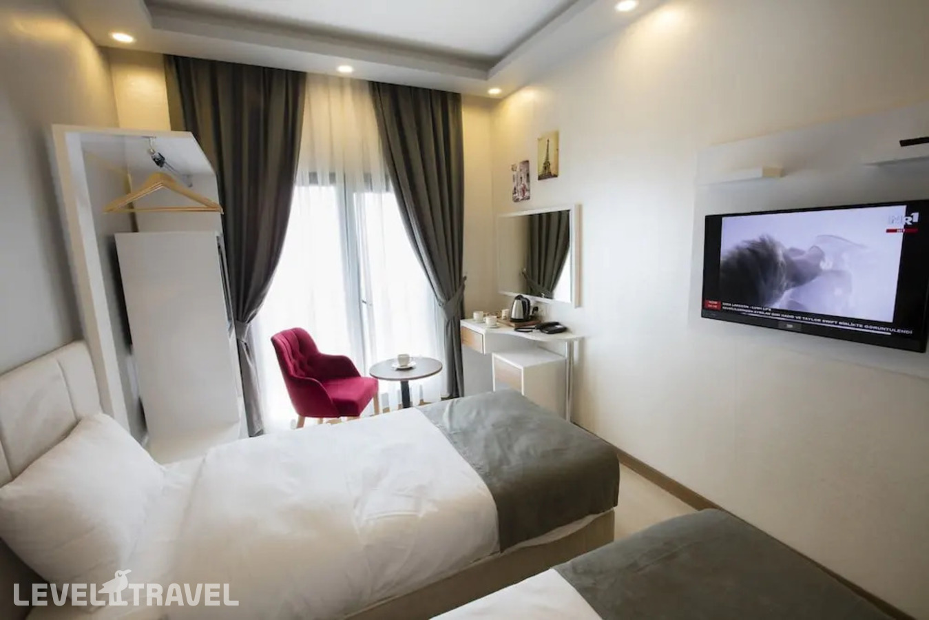 фотографии номера Делюкс (две односпальные кровати) отеля Royal Inci Airport Hotel в Турция(Кючюкчекмедже) - фото №1