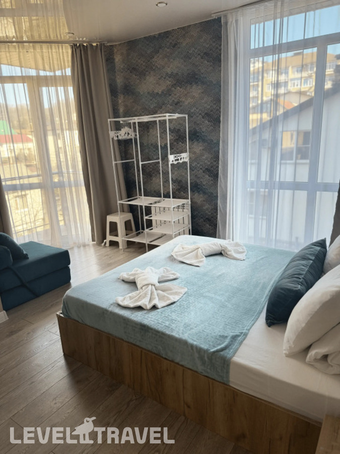 Двухместный люкс Premium с балконом и с видом на город двуспальная кровать — фото 6
