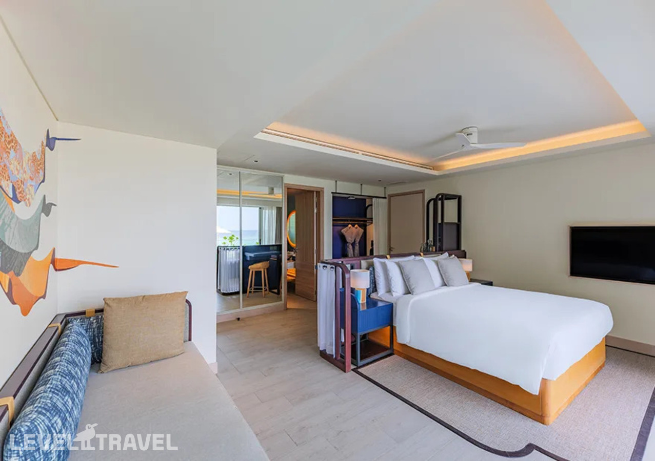 фотографии номера Премиум с видом на пляж (две односпальные кровати) отеля Avani+ Fares Maldives Resort в Мальдивы(Баа Атолл) - фото №2