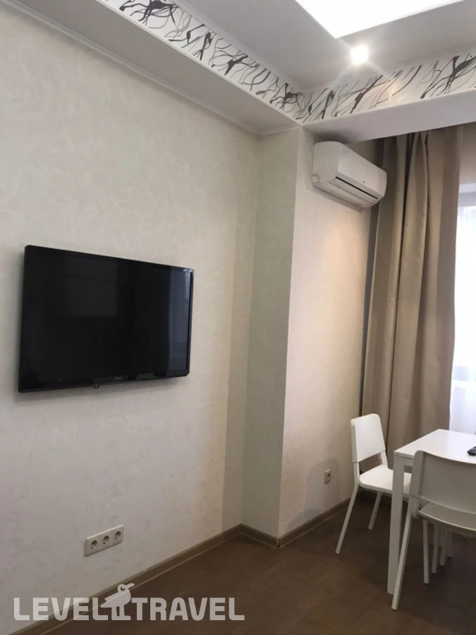 фотографии номера Двухместные апартаменты c 1 комнатой с видом на город двуспальная кровать отеля Апартаменты С Кухней На Ул. Дмитриевой 2а в Россия(Сочи - Центр) - фото №3