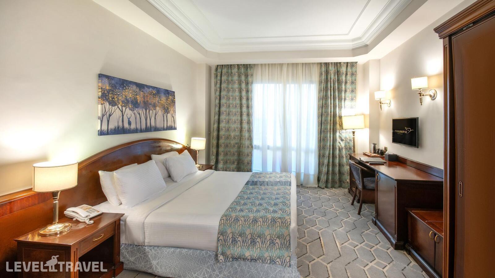 фотографии номера Стандартный номер отеля Triumph Plaza Hotel в Египет(Каир) - фото №1