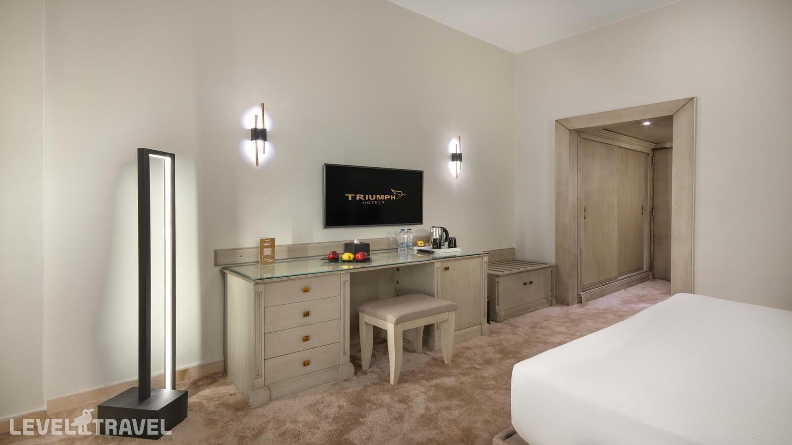 фотографии номера Делюкс отеля Triumph Plaza Hotel в Египет(Каир) - фото №2