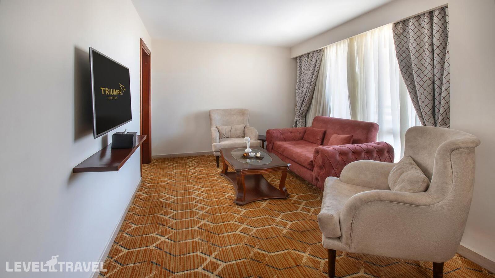 фотографии номера Полулюкс отеля Triumph Plaza Hotel в Египет(Каир) - фото №1